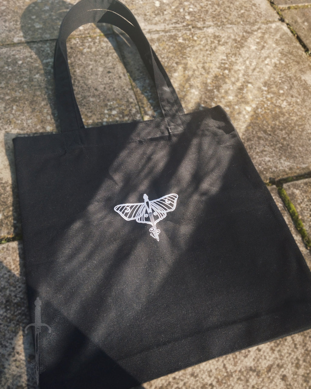 The Moonlight & Malice Embroidered Moth Tote Bag in Black
