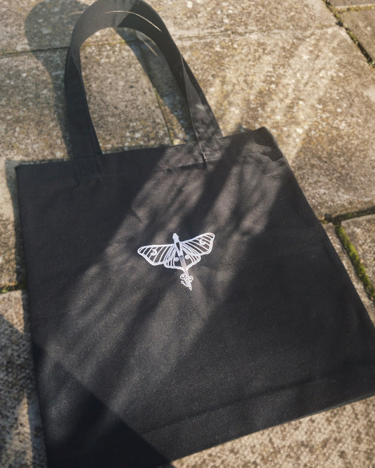 The Moonlight & Malice Embroidered Moth Tote Bag in Black