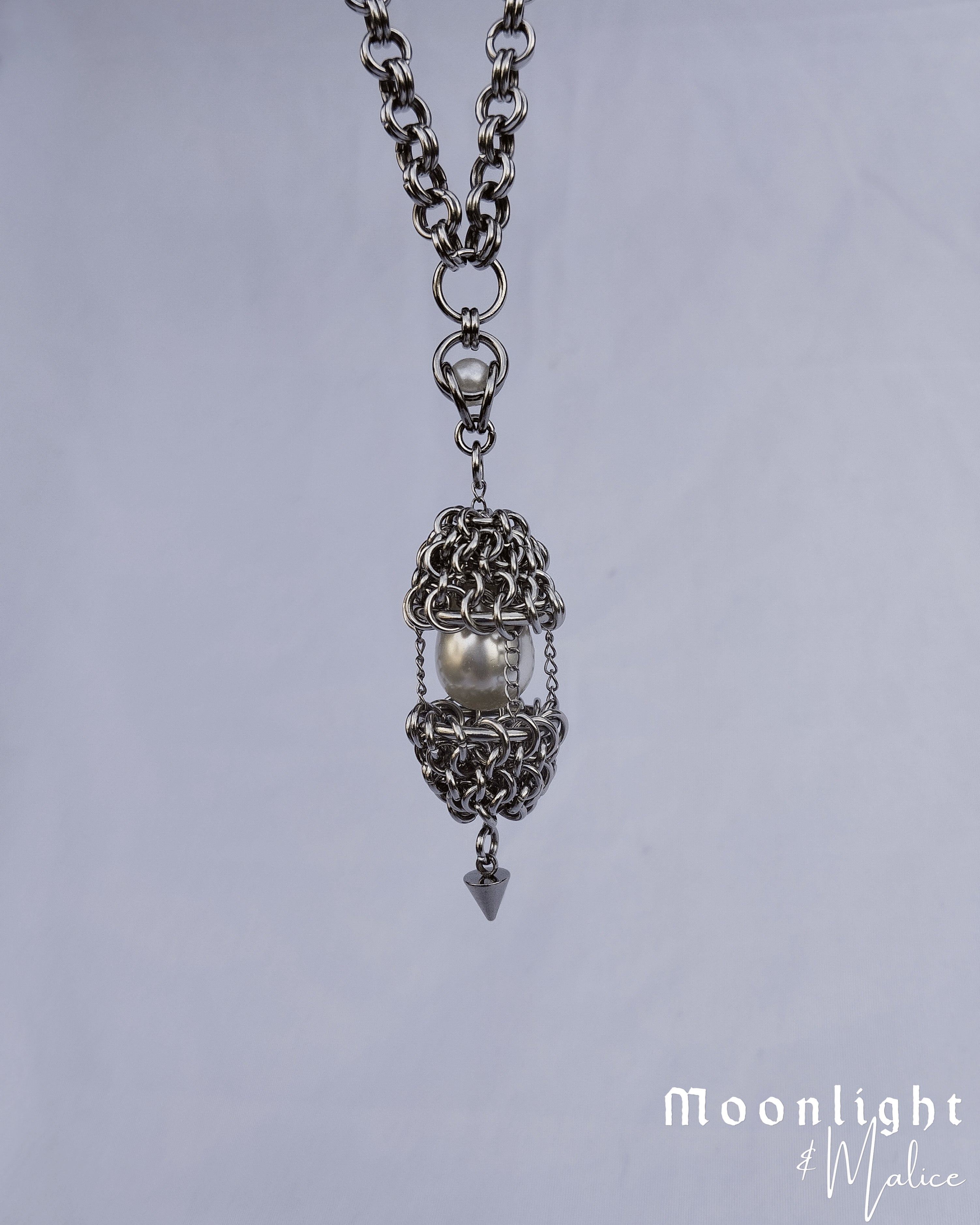 The Angel’s Egg Chainmail Pendant Necklace in Stainless Steel