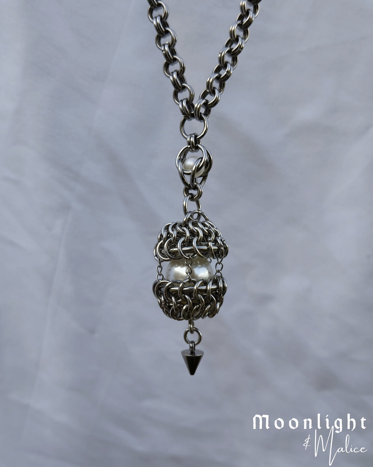 The Angel’s Egg Chainmail Pendant Necklace in Stainless Steel